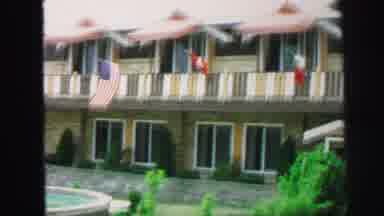 Lynbrook New York (1971): View Of Swimming Pool Next To Yellow And Brown Building