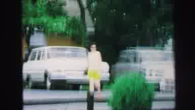 Lynbrook New York (1971): Young Woman In Green Shorts White Shirt And Glasses