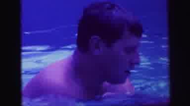 Lynbrook New York (1971): A Fat And Fair Man Is Bathing In The Blue Waters Of The