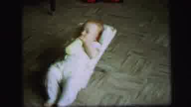 Lynbrook New York (1971): A Very Young Child Laying Down And Drinking From A