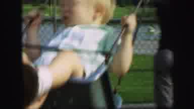 Lynbrook New York (1971): Older Woman Pushes Two Children Swinging Back And Forth