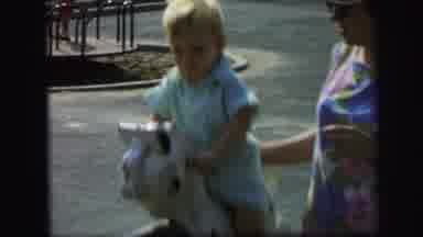 Lynbrook New York (1971): Toddler Enjoying The Outside Horse Riding On The Outside