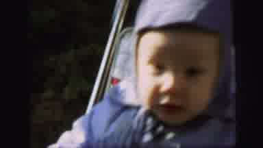 Lynbrook New York-1971: Baby Moves Front And Backwards In Stroller