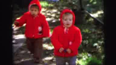 Lynbrook New York (1971): Two Kids In Red Coats Run At Camera