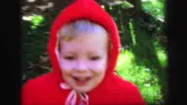 Lynbrook New York (1971): Toddler Wearing Red Coat Walks To Car With Person