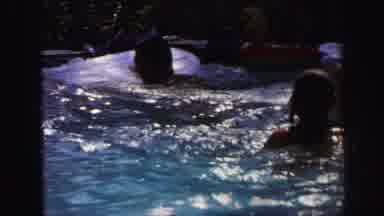 Lynbrook New York (1971): A Group Of People Splashing And Playing Around In A