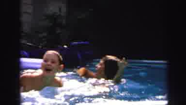 Lynbrook New York (1971): Some Children Play In Pool With Floats And Splash Around