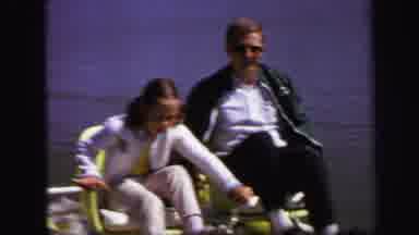 Lynbrook New York (1971): Man And Children Paddle A Paddle Boat On Water