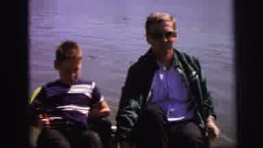 Lynbrook New York (1971): Grandpa And Grandson Sit On The Water And Talk To Each
