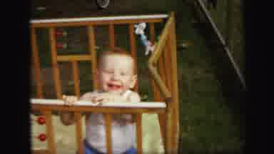 Lynbrook New York (1971): A Child Is Sitting In His Tub And Laughing
