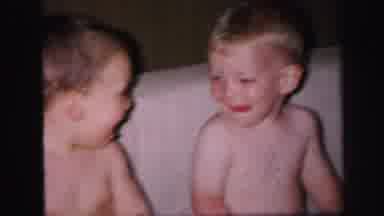 Lynbrook New York (1971): 2 Little Children Having Fun And Smiling Towards Each
