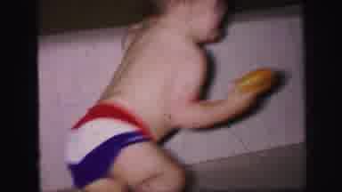 Lynbrook New York (1971): Two Toddler Boys In Swimsuits And Shoes Playing With