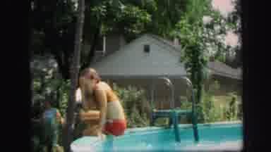 Lynbrook New York (1971): A Girl In A Bathing Suit Falls Backward Into A Swimming