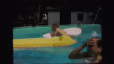Lynbrook New York (1971): The Childs Are Swimming In The Water They Together And