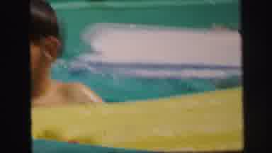 Lynbrook New York (1971): Boy Falls Off Pool Float While Another Boy Climbs Out Of