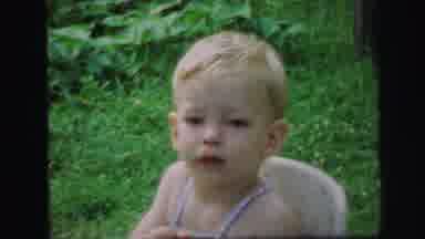 Lynbrook New York (1971): Toddler Upset And Crying In Highchair Outside