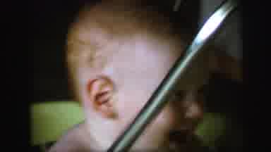 Lynbrook New York (1971): Baby Laughing In A Laundry Basket