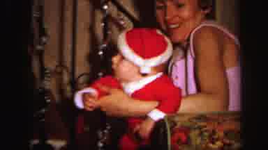 Lynbrook New York (1971): The Mother Shows Her Baby A Christmas Dress