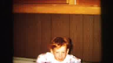 Lynbrook New York (1971): A Small Boy Is Playing With A Hat In Front Of The