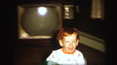Lynbrook New York (1971): Happy Kid With Green Hat Running Around A Living Room In