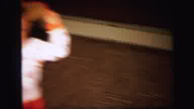 Lynbrook New York (1971): Boys Wearing Red And White Pajamas Play With Yellow