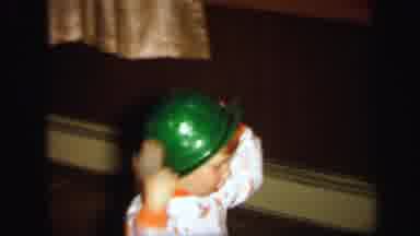 Lynbrook New York (1971): Baby Boy Is Walking With Green Hat And Girl Is Standing