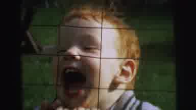 Lynbrook New York (1973): A Child Looks At Another Child And Smiles Beautifully