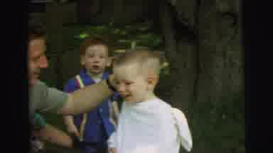 Lynbrook New York (1973): Father Cutting A Boy's Hair Then The Boys Are Playing On