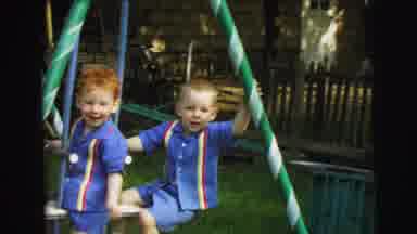 Lynbrook New York (1973): Two Boys In Blue Playing Outside On A Swing Set