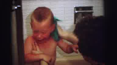 Lynbrook New York (1973): Person Wipes Crying Child Standing In Bathtub With Green