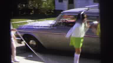 Lynbrook New York (1973): Several Preteen Girls Jump Roping By A Vintage Car