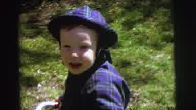Lynbrook New York (1973): A Cheesy Toddler Enjoying A Day Outside
