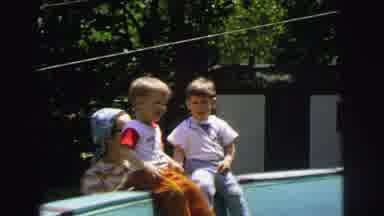 Lynbrook New York (1973): Two Boys Sitting On Edge Of Empty Pool On A Sunny Day