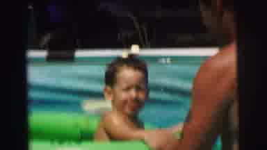 Lynbrook New York (1973): Jump Throw Green Shorts Floating Tire Dad Son Pool Water