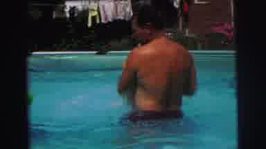 Lynbrook New York (1973): A Father Bonding With His Child Over Swimming In The