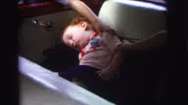 Lynbrook New York (1973): Two Individuals Touching The Top Of The Toddler Head To