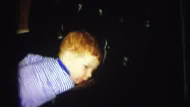 Lynbrook New York (1973): Blue And White Striped Shirt Red Haired Boy Climbs