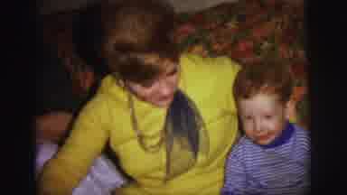Lynbrook New York (1973): Two Mothers Sit Together On And Couch With Their Kids