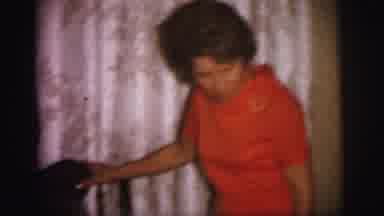 Lynbrook New York (1973): Several People (Possibly A Family) Looking At And