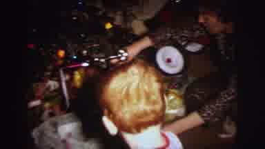Lynbrook New York (1973): Happy Children Wearing Pajamas Gather Around The