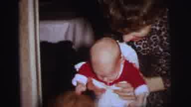 Lynbrook New York (1973): Woman Picking Up Baby