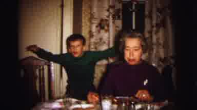 Lynbrook New York (1973): Playful Child Behind Woman At A Table With Other Women