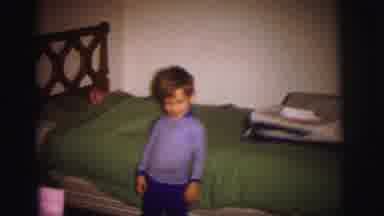 Lynbrook New York (1973): A Boy Stands In Front Of A Bed And Then Goes Over To