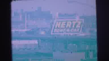 Lynbrook New York (1973): Shaky And Grainy View Of A Sign That Reads Hertz Rent A