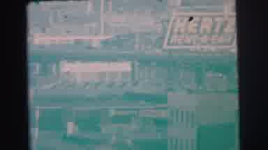 Lynbrook New York (1973): Large White Hertz Rent -A-Car Sign On A Sunny Day