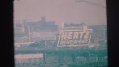 Lynbrook New York (1973): A Sign For Hertz Rent A Car With An Industrial Looking