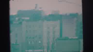 Lynbrook New York (1973): An Overview Of An Urban Area With Brick Buildings And A