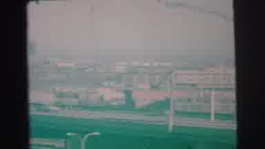 Lynbrook New York (1973): Busy Highway Has Cars Racing By And The City Is Shown As