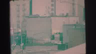 LYNBROOK NEW YORK-1973: Smoggy Cityscape with Nondescript Industrial Buildings