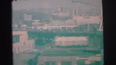 Lynbrook New York (1973): A Cityscape Of A Large City With Highways Running